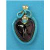Image 1 : A Victorian gold heart shape pendant, set with a carbuncle framed by a blue enamel snake motif, t...