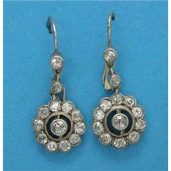 A pair of Edwardian gold and diamond drop earrings, each millegrain set with an 11-stone cluster...