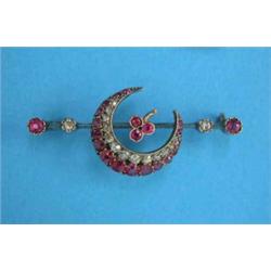 A Victorian gold and silver crescent-and-clover-leaf bar brooch, set rubies and diamonds...