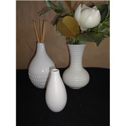 three white vases