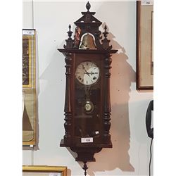 ANTIQUE FIGURAL WALL CLOCK IN WORKING ORDER