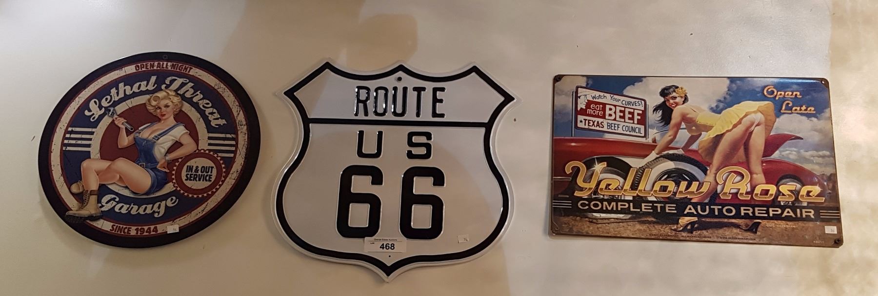 THREE NOVELTY TIN SIGNS