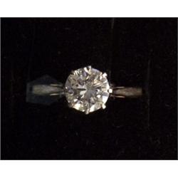 A single stone ring, set with a brilliant cut diamond weighing approximately 1.00ct, stamped 18ct...