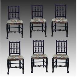 A set of six elm and rush seat country dining chairs, second quarter 19th Century, with shaped to...