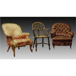 A Victorian walnut and upholstered armchair, circa 1870, with purple arched button back, bowed se...