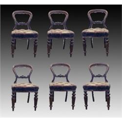 A set of six William IV mahogany and upholstered dining chairs, circa 1835, the shaped backs with...