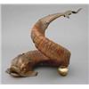 Image 1 : A horn table ornament, modelled as a mythical fish with brass-mounted head and tail, H 9ins...