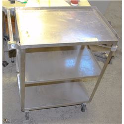 3 TIER SHELF WITH WHEELS.