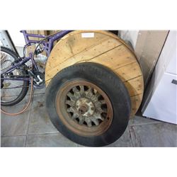 VINTAGE WOOD SPOKE WHEEL AND TWO ROUND WOOD BARRELL TOPS