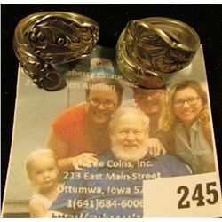 2 DIFFERENT PATTERN ALVIN STERLING BY GORHAM RINGS.  ONE IS A HOLLY PATTERN.  THE OTHER IS A VIOLET 