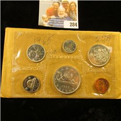 1965 CANADIAN MINT SET.  THE DOLLAR, HALF DOLLAR, QUARTER, AND DIME ARE SILVER