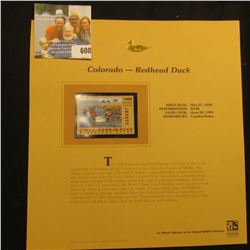 1998 Colorado Waterfowl $5.00 Stamp depicting a flock of Rehead Ducks, Mint, unsigned, in vinyl page