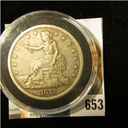 1877 S U.S. Silver Trade Dollar, F-VF. A nice authentic specimen of a rarely found coin. Still store