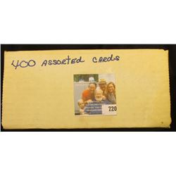 Approximately 400 Assorted Sports Cards in a box.