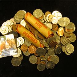 Glass Jar full of coins including some Buffalo Nickels and some silver.  I have not had time to sort
