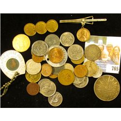 A Nice Selection of Foreign Coins, Jewelry, and etc. including an early encased Lincoln Cent in a Ho