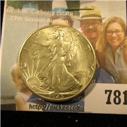1945 D Walking Liberty Half Dollar, Lightly toned Brilliant Uncirculated.