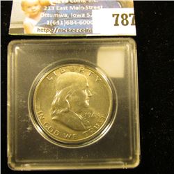 1948 D Franklin Half Dollar, lightly toned, near full Bell Lines Uncirculated. In a Snaptight holder