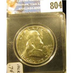 1954 P Franklin Half Dollar, Brilliant Uncirculated. Mounted in a Snaptight case.