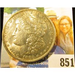 1886 O U.S. Morgan Dollar, lightly toned Brilliant Uncirculated.