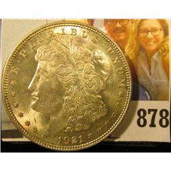 1921 P U.S. Morgan Silver Dollar, Brilliant Uncirculated. Light gold toning.