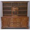 Image 1 : A George III oak dresser, the upper part having moulded and shaped cornice, over central fielded...