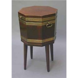 A George III mahogany octagonal wine cooler, cross-banded in tulipwood, line-inlaid in boxwood an...