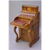 Image 1 : A Victorian burr-walnut piano-fronted davenport, with metamorphic stationery compartment and a fu...