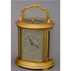 A 19th century brass carriage clock, retailed by The Sheffield Goldsmiths Company Ltd, Fargate, t...