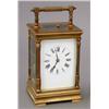 Image 1 : A 19th century brass repeating carriage clock, the movement striking on gong and having enamelled...