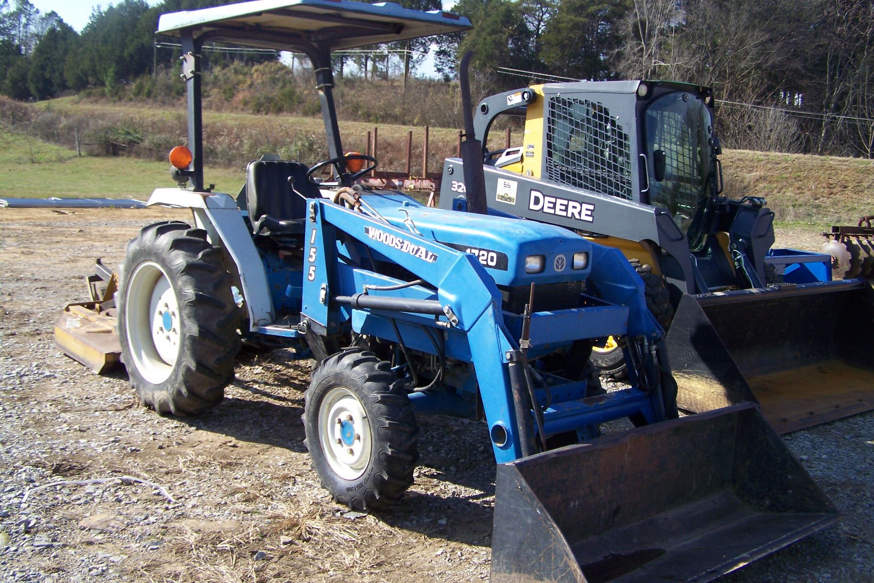 NEW HOLLAND 1720 TRACTOR W/ WOODS DUAL 155 LOADER W/ BUCKET, HOURS