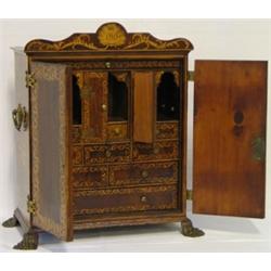 Late C19th / early C20th Italian decorated table cabinet, the 2 doors enclosing...