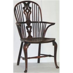 Good early C19th yew wood Windsor elbow chair with pierced splat, on cabriole...
