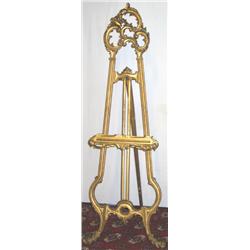 Late C19th giltwood adjustable artist's easel with carved 'C'-scroll, floral &...