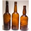 Image 1 : Three Embossed Western Whiskey Bottles