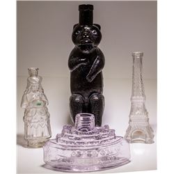4 Figural Bottles