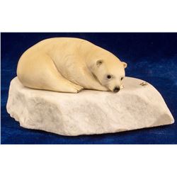 Polar Bear Resting on an Ice Flow