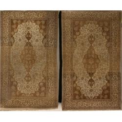 Not Illustrated, Pair of Keshan Rugs, Circa 1950, Each beige ground with palmette and trell...