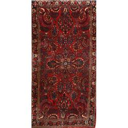 Sarouk Rug, Circa 1950, Red ground with floral spray field within a palmette and trellising v...