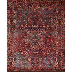 Kerman Rug, Circa 1950, Red ground with palmette and trellising vine field centering a star m...