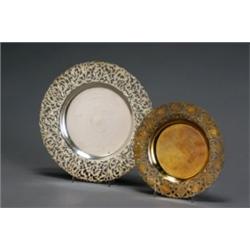 Group of Eighteen Middle Eastern Silver Pierced Border Plates, 20th Century, Consisting of tw...