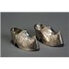 Image 1 : Pair of Dutch Rococo Style Silver Shoes, Circa 1900, Each embossed with harbor landscapes and...