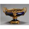 Image 1 : SFvres-Type Ormolu Mounted Centerpiece, First Quarter 20th Century, The cobalt blue oval bowl...