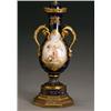 Image 1 : SFvres-Type Urn, Circa 1900, Depicting three putti within a raised gilt border on a cobalt bl...