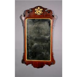 George III Parcel Gilt Mahogany Mirror, Last Quarter 18th Century, Cracks and repairs to vene...