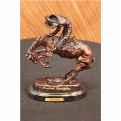 Signed Frederic Remington Cowboy on horse batteling a Rattle Snake Bronze Statue
