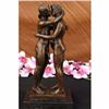 Image 1 : Two Gay Men Engaging in a flirtatious kiss Statue Number
