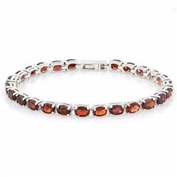 **** FEATURE ITEM **** BRACELET - 12.70 CTW (25) OVAL FACETED GARNETS IN  925 STERLING SILVER SETTIN