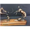 Image 9 : Takin’ Down the Wash, Bronze by Pamela Harr