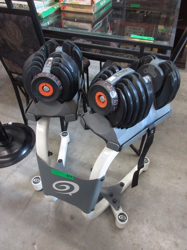 Nautilus Dumb Bell With Weights on Stand